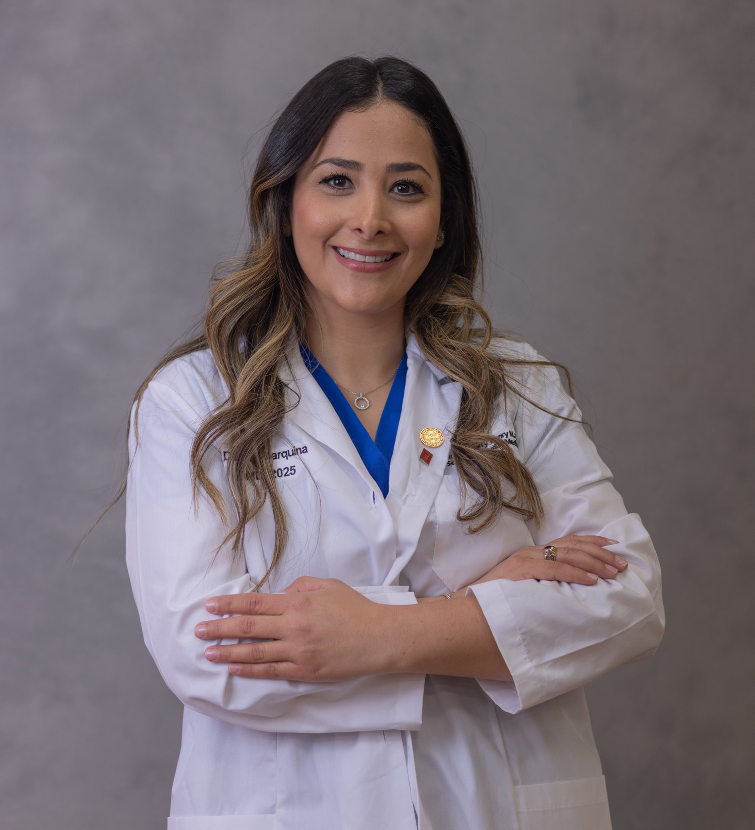 Dr. Dayna Marquina