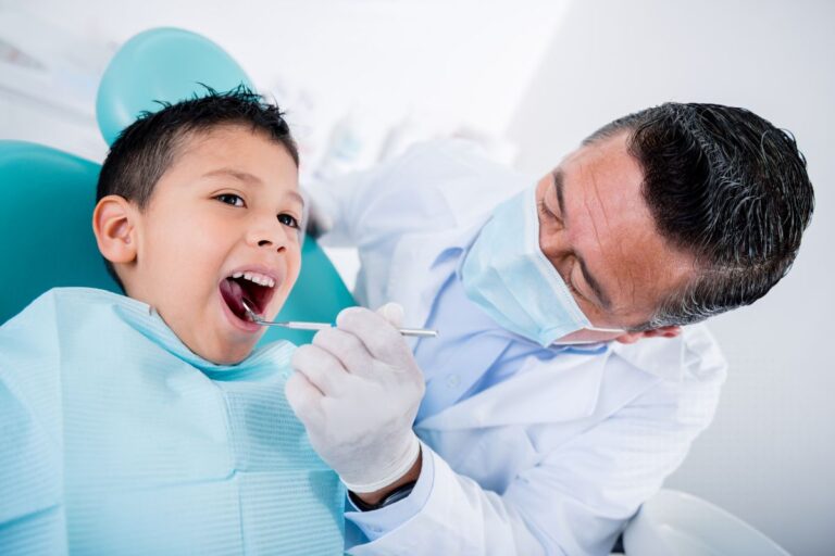 Parent helping child prepare for a dental checkup